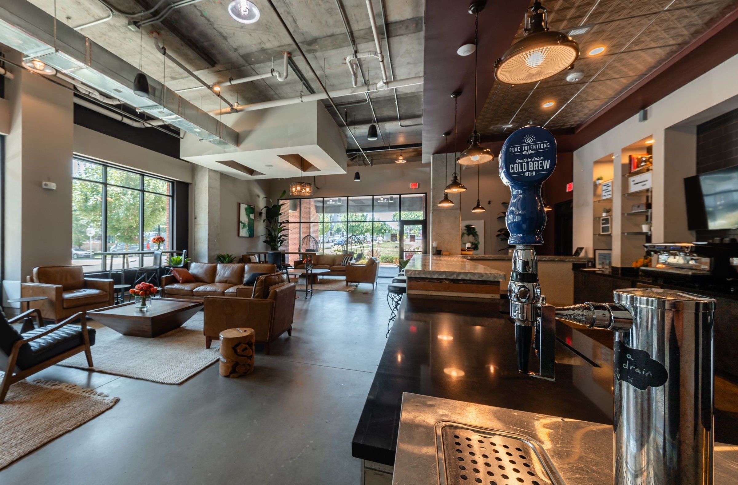 The Village at Commonwealth resident lounge and coffee bar with cold brew tap