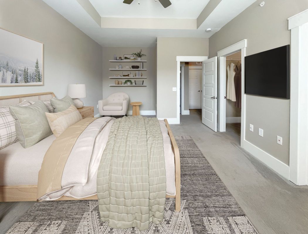 The Village at Commonwealth furnished townhouse bedroom with bathroom access