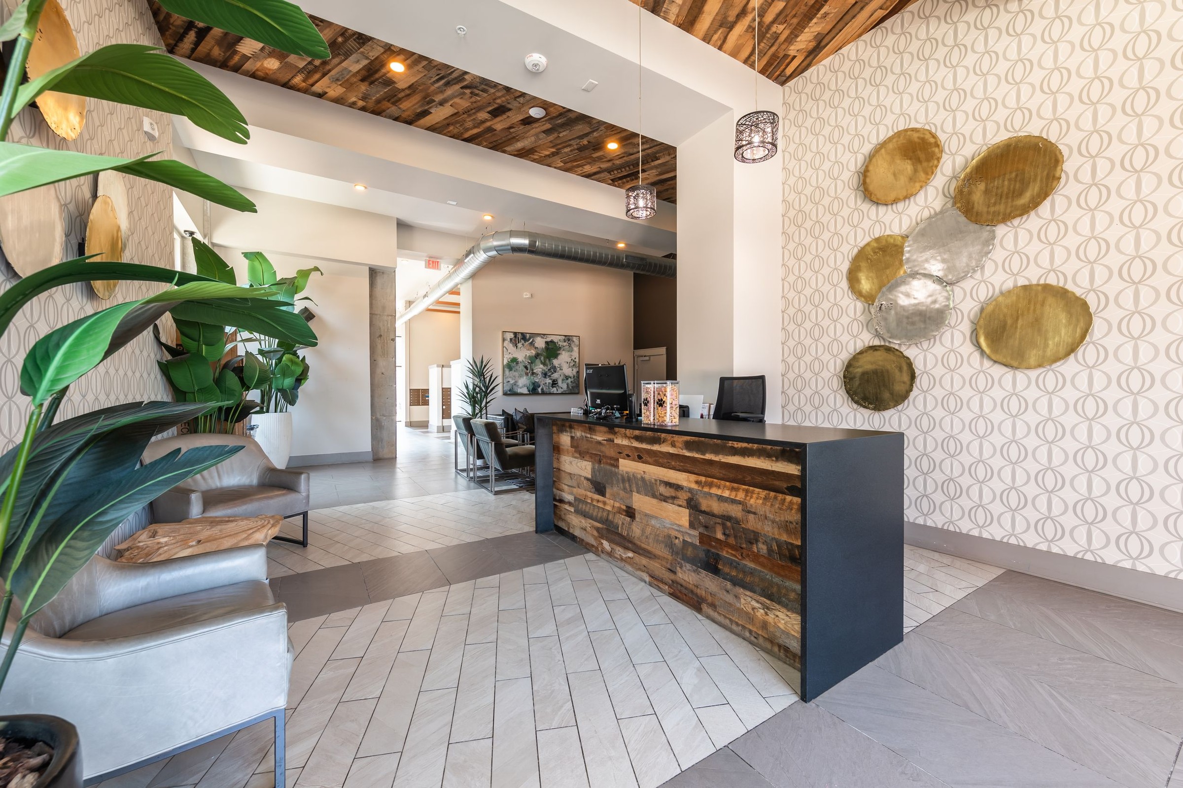 The Village at Commonwealth concierge desk in modern designed lobby