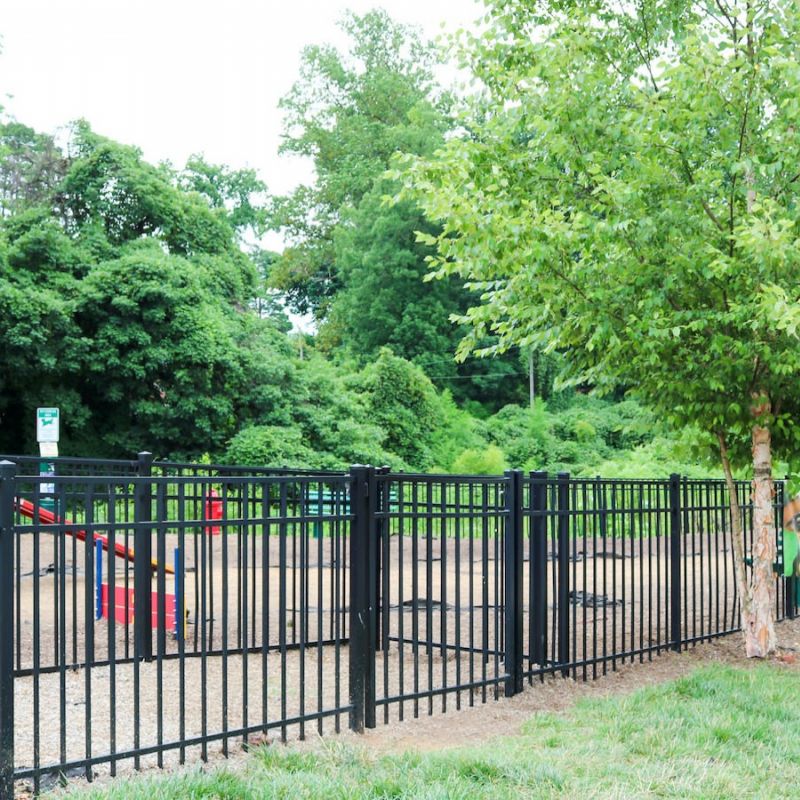 The Village at Commonwealth on-site dog park with agility equipment
