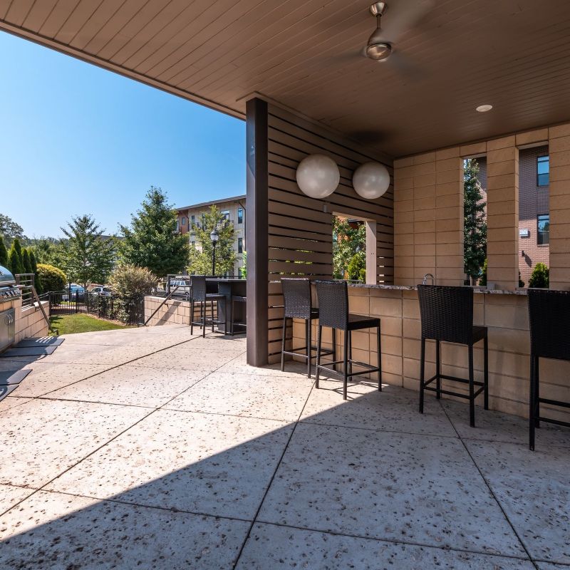 The Village at Commonwealth outdoor Cabana bar with bar and seats